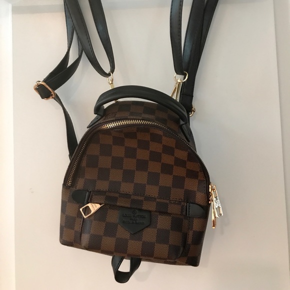 Black louis vuitton mini backpack new arrivals